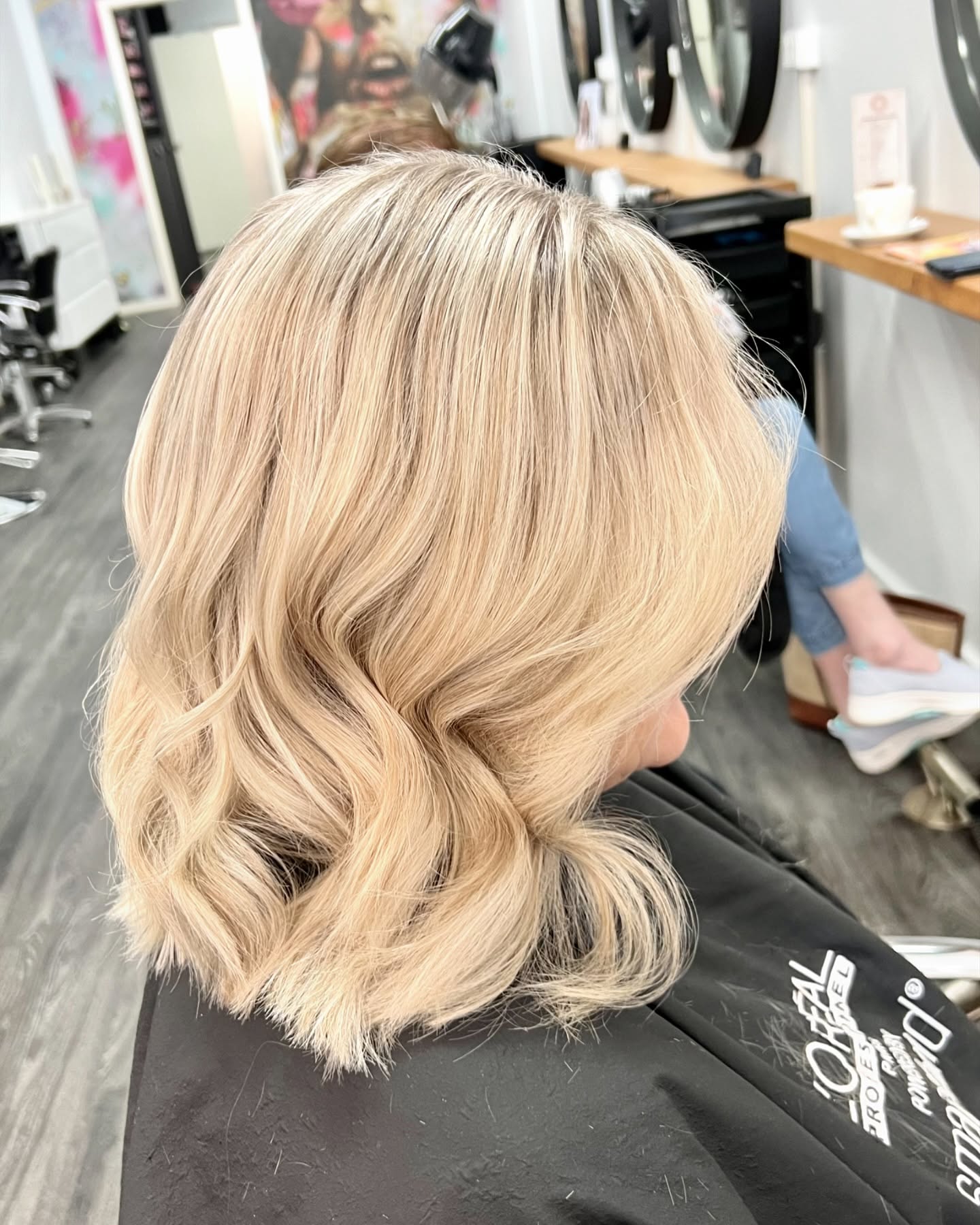 Soft, smooth blonde blow wave finished at Rosewood in Woonona